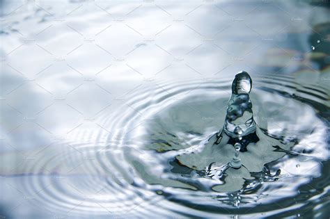 Close Up Of Drop In Water Making Dif Stock Photos ~ Creative Market