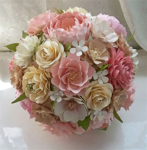Glue ribbon around the toilet paper roll, and then place the popsicle stick paper flowers inside the toilet paper roll. Paper Bouquet Paper Flower Bouquet Wedding Bouquet ...