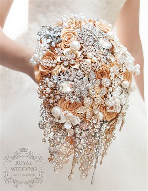 A Bridal Bouquet With Pearls And Brooches Is Shown In This Image