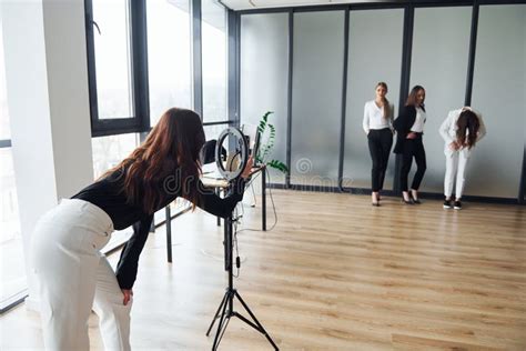 Backstage Of Photoshoot Group Of Adult Women That In Formal Clothes Is