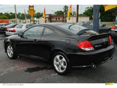 Save money on one of 8 used 2005 hyundai tiburons near you. 2005 Obsidian Black Hyundai Tiburon GS #35177726 Photo #11 ...