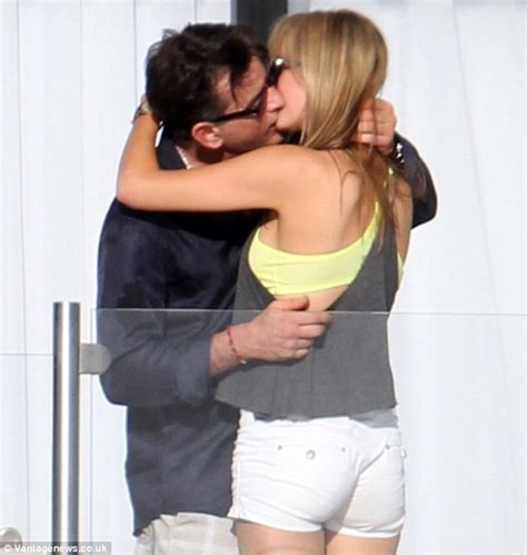 Charlie Sheen Enjoys A Passionate Kiss With Adult Film Star Brett Rossi As He Marks Thanksgiving