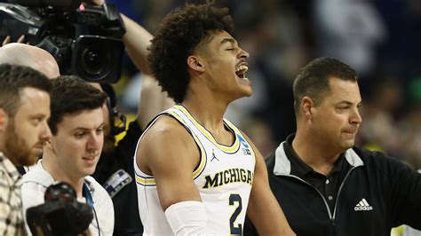Jordan poole (golden state warriors) with a buzzer beater vs the utah jazz, 05/10/2021. March Madness 2018: Michigan sinks buzzer-beater to ...