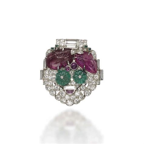 An Art Deco Ruby Emerald And Diamond Tutti Frutti Brooch By Cartier
