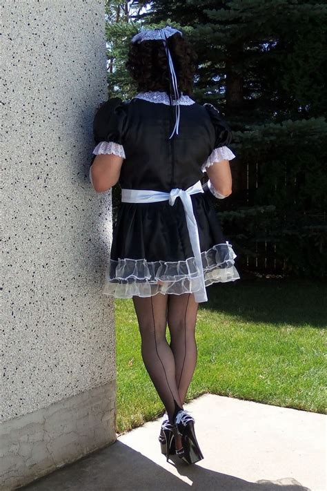 posing in my satin french maid s dress my dress is trimmed with white organza with a white