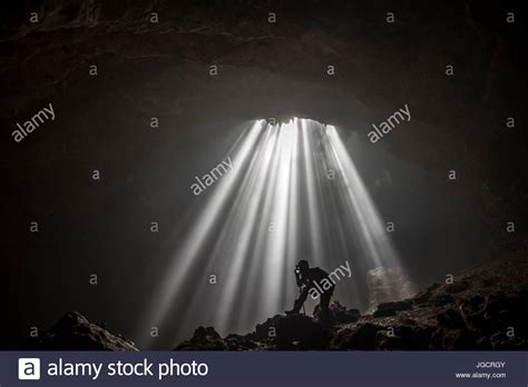Silhouette Of A Man Taking A Photograph Jomblang Cave Central Java