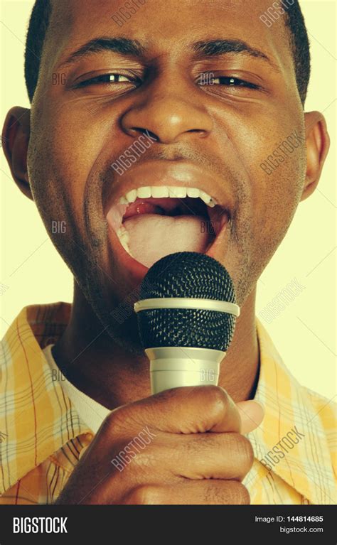 Black Man Singing Into Image And Photo Free Trial Bigstock