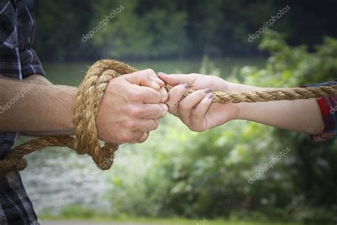 Couples Hands Tied With Rope — Stock Photo © Sgtphoto 51937241