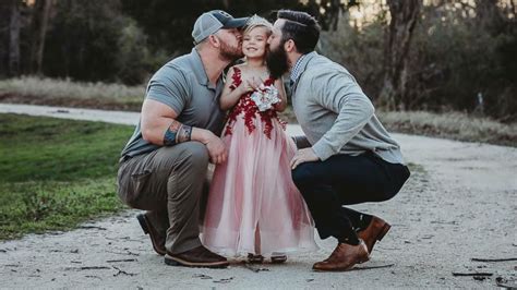 Find gifs with the latest and newest hashtags! 'We are the adults': Dad and step-dad pose with daughter ...