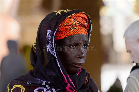 Unidentified Senegalese Woman In Colored Traditional Clothes An
