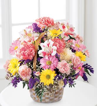 Let this exquisite composition of beautiful white blossoms deliver your sympathy and comfort loved ones grieving a loss. The FTD Basket Of Cheer Bouquet in Bloomer, WI | Bloomer ...