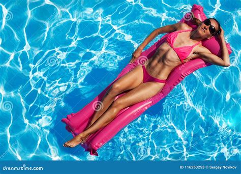 Woman Enjoying Suntan On The Air Mattress Stock Image Image Of Bikini