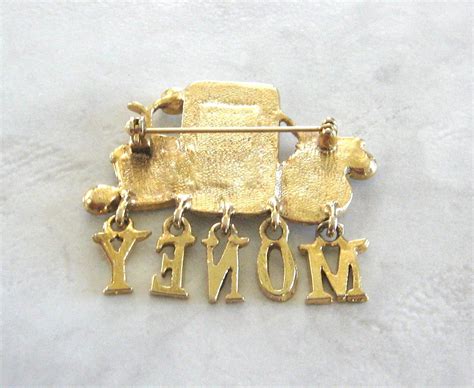 Gold Money Bag Rolls Royce Rhinestone Brooch Pin Vintage Jewelry 1980s