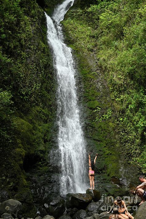 Girl Enjoying A Hawaiian Waterfall Photograph By Colin Giles