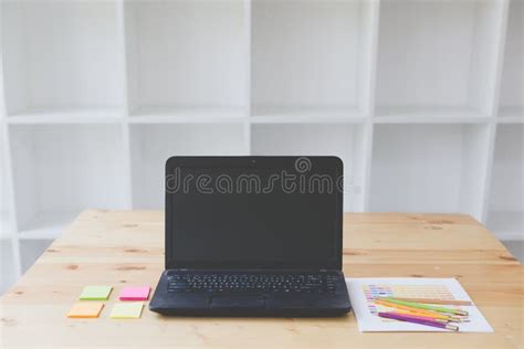 Graphic Designer Desk Table With Computer Sticky Note And Color Stock
