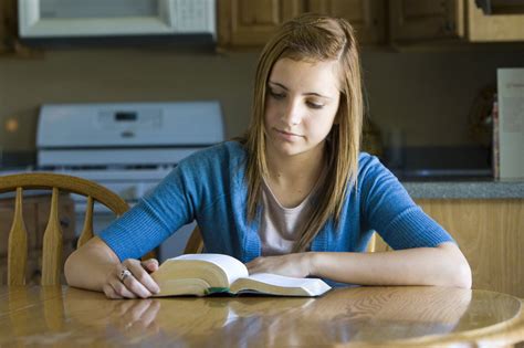 Young Woman Reading The Scriptures