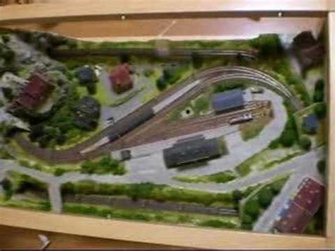 Computerized coffee table trains for the 21st century. Z SCALE Freight Train in Coffee Table Layout - YouTube