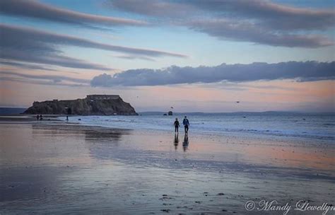 Sunset Reflections At Tenbys South Beach Pembrokeshire Flickr