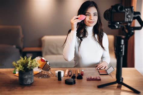premium photo beauty blogger nice female filming daily make up routine tutorial on camera