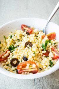 Let couscous stand, covered, 5 minutes, then fluff with a fork and stir in herbs, lemon juice, remaining tablespoon oil, and salt and pepper to taste. Lemon and Parsley Couscous Pearls - The Cookware Geek
