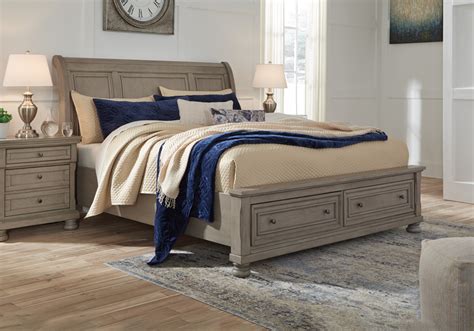 Try a feminine set with lots of elaborate detailing for you girls room or metal bedroom sets with a. Lettner Light Gray King Sleigh Storage Bedroom Set ...