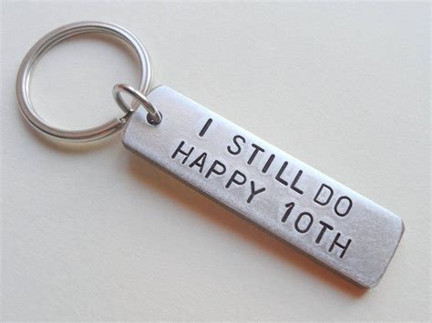 This custom word block will be made just for you. Aluminum Tag Keychain Engraved with "I Still Do, Happy ...