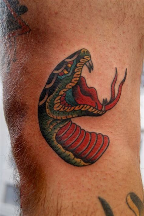 Wonderful Traditional Snake Head Tattoo Design For Sleeve Traditional