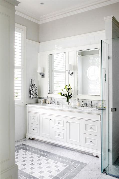 Both neutral and versatile, a white bath vanity can stand out as the room's focal point or fade into the background. Minimalist White Bathroom Designs to Fall In Love