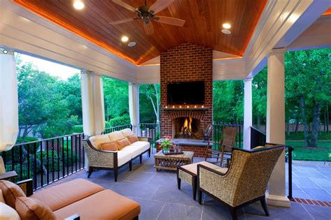 Chandeliers do not always have to be large and in charge. Covered Porch & Fireplace. Stained V-Groove ceiling ...