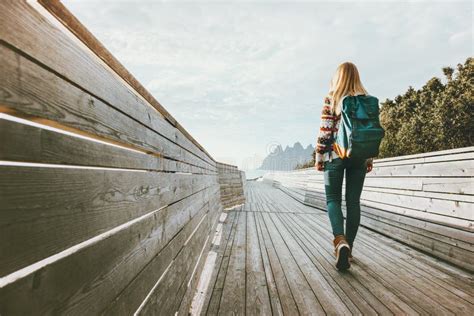 Woman Walking Alone On Bridge Travel Sightseeing Stock Photo Image Of
