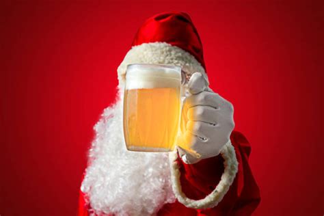 Santa Drinking Beer Stock Photos Pictures And Royalty Free Images Istock