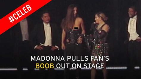 Madonna Shocks As She Pulls Down A Female Fan S Top To Reveal Her Bare