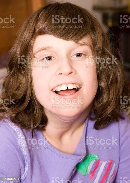 Portrait Of A Special Needs And Autistic Girl Stock Photo Download