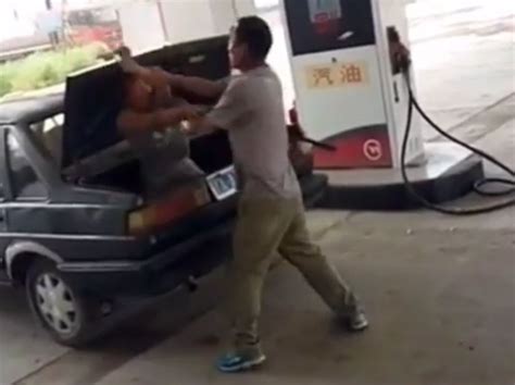 Video Man Caught On Video Hitting Wife Stuffing Her Into Car Trunk