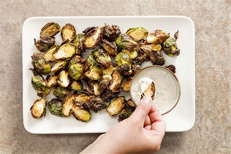 Crispy on the outside, tender and delicious on the inside. Air Fryer Brussels Sprouts - Bryan's Foodie Site