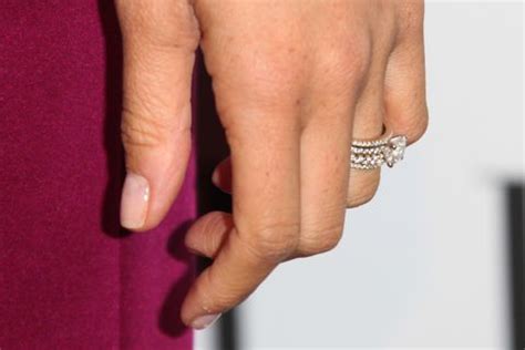 Harry's and meghan's wedding bands. This Is What Meghan Markle's First Engagement Ring Looked Like
