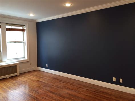 Dramatic accent wall. | Accent walls in living room, Blue accent wall living room, Blue accent walls