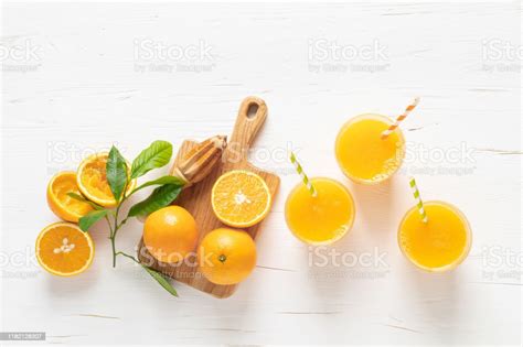 Orange Juice Freshly Squeezed Juice In Glasses And Fresh Fruits With