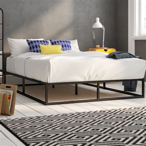 Crafted from steel with a white finish, this platform bed includes a slat kit, so there's no need to add a box spring: Mercury Row Hamby Platform Bed & Reviews | Wayfair.co.uk