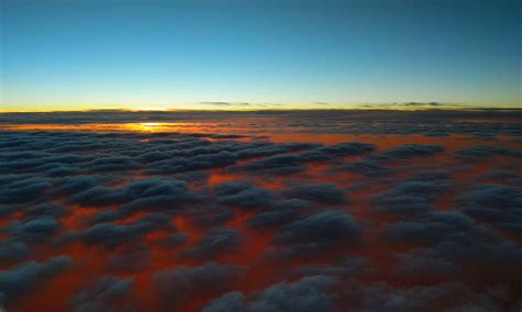 1366x768 Sunset Above Clouds 1366x768 Resolution Hd 4k Wallpapers
