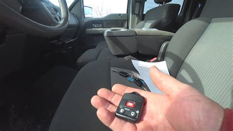 Press any button on the ford remote to be programmed. How To Program a Key Fob to a Ford F150 - YouTube