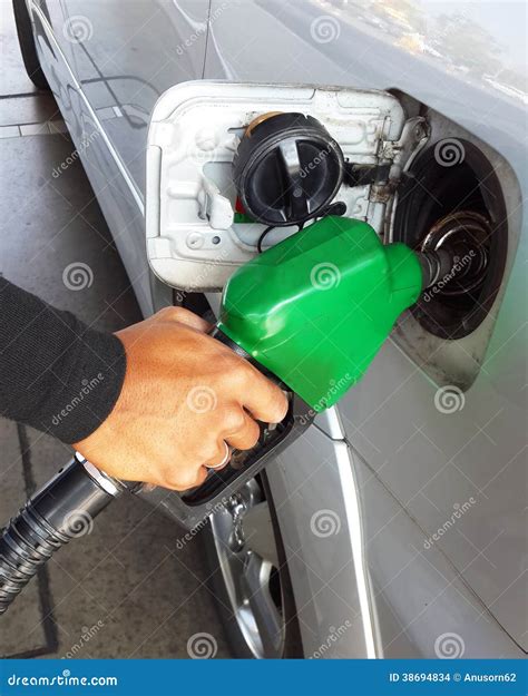 Closeup Of Man Pumping Gasoline Fuel In Car Stock Photo Image Of
