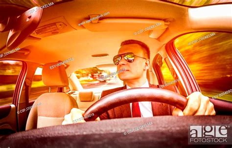 Man Driving A Car Stock Photo Picture And Low Budget Royalty Free