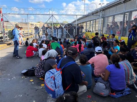 migrant protesters occupy u s mexico border bridge crossing closed firstpost