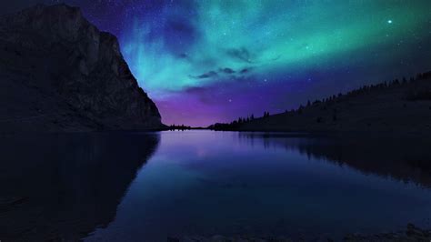 1366x768 Aurora Borealis Northern Lights Over Mountain Lake 1366x768