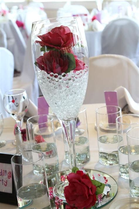 Champagne Glasses With Flowers And Floating Candles Would Love Centerpiece Diy Candle