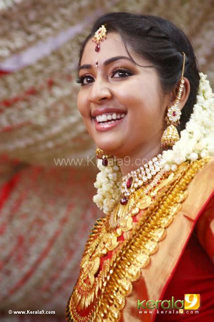 Hot And Sexy Actress Pictures Navya Nair Doing Makeup To Get Ready For
