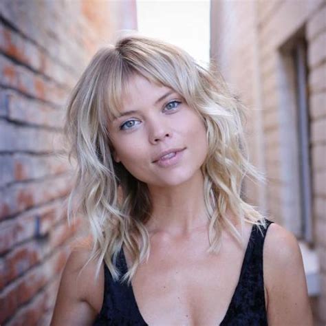 Long blonde hair with blended bangs. 20 Wispy Bangs to Completely Revamp Any Hairstyle