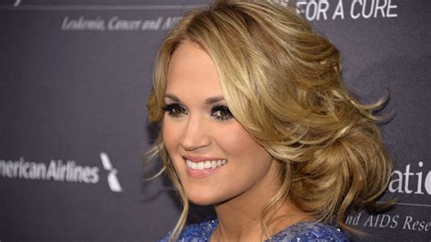 Carrie Underwood Tries A New Hairstyle Manages To Up The Bombshell