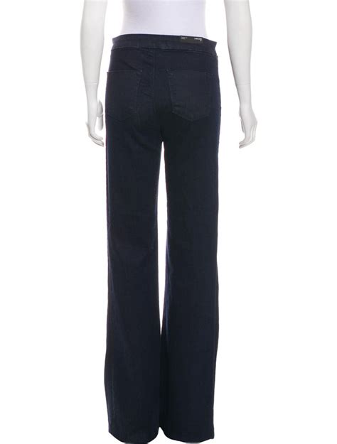 Dark Wash Blue J Brand Mid Rise Flare Jeans With Dual Patch Pockets At Back Tonal Stitching